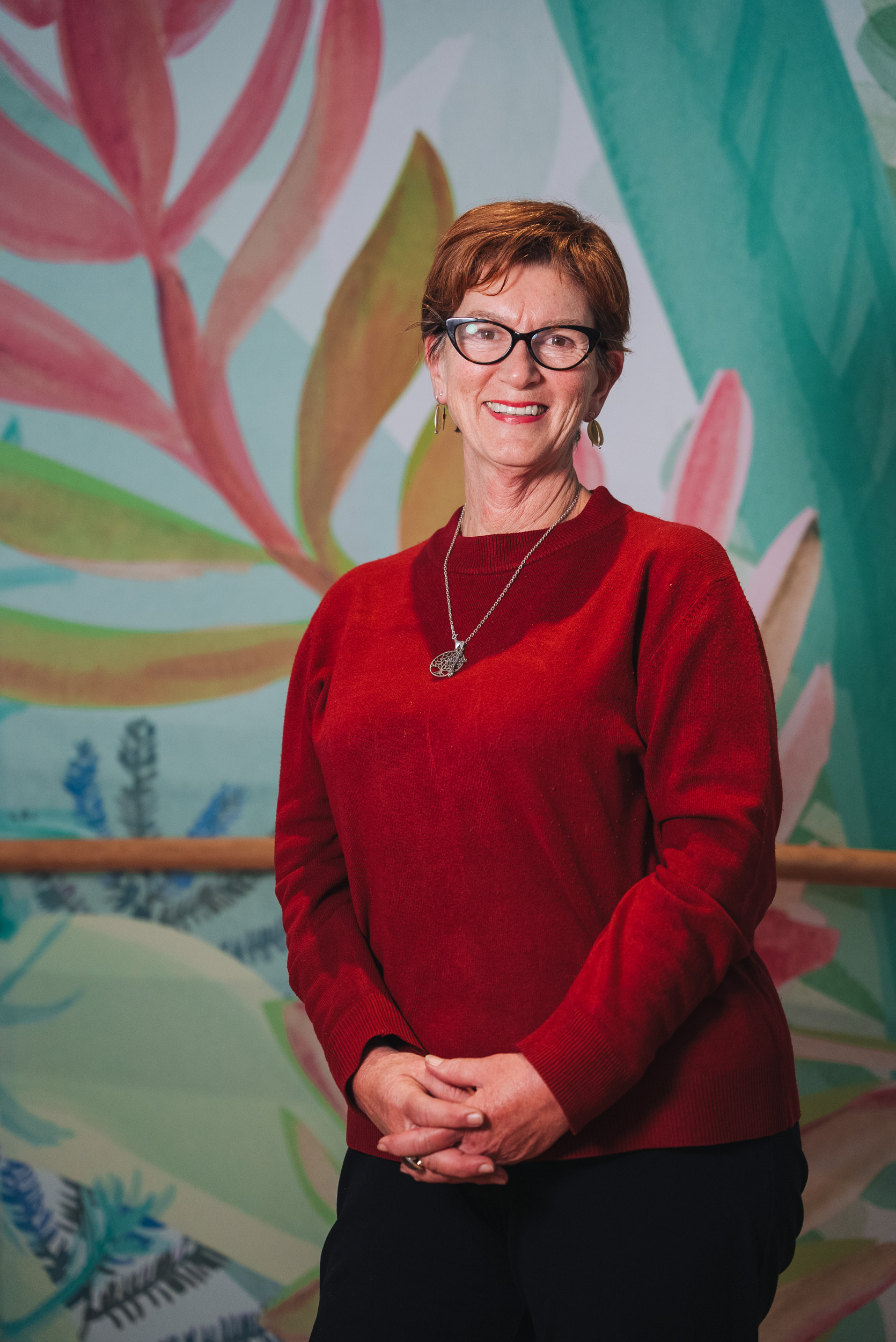 A person wearing a red sweater