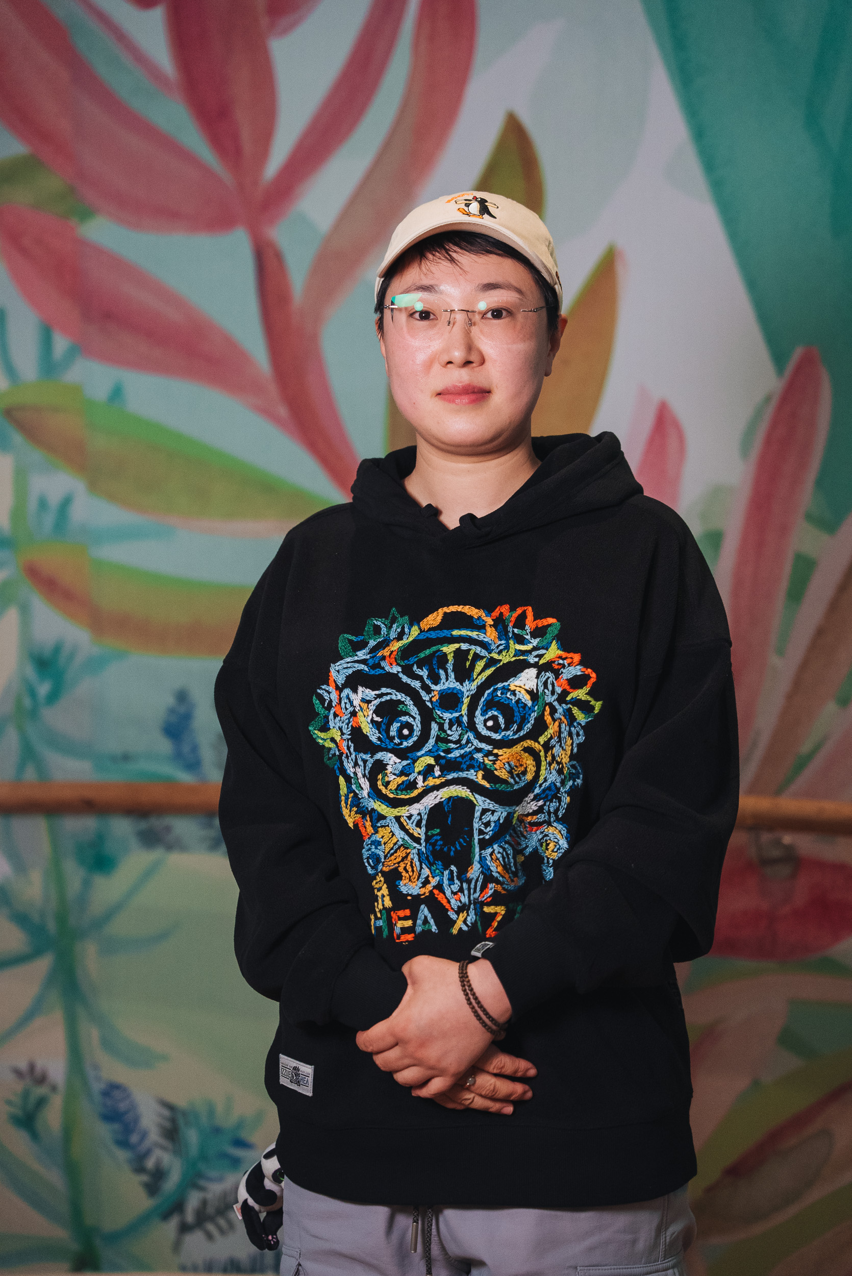 A person wearing a black jumper