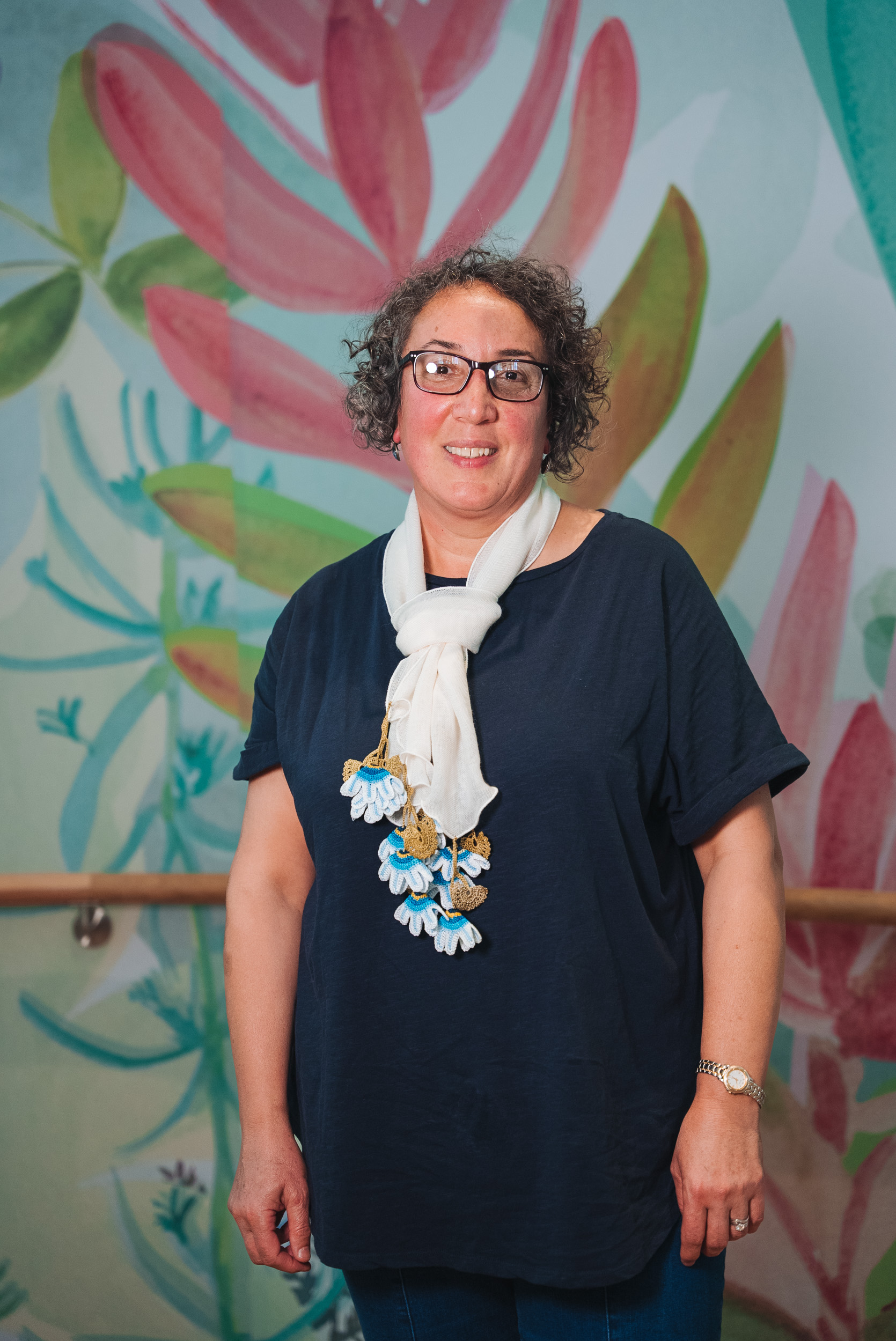 A person wearing a white scarf