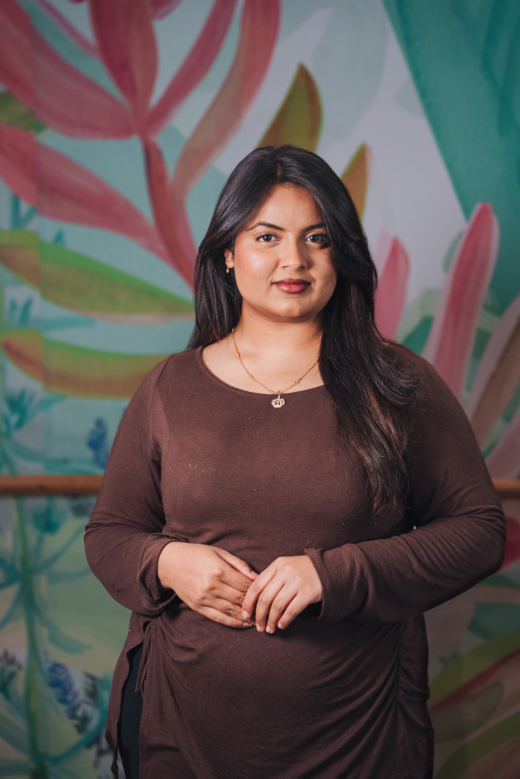 A woman with a brown tshirt A woman with a brown tshirt