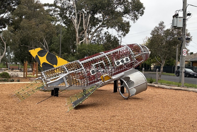 Climbing unit in the shape of a plane in the children's playground.