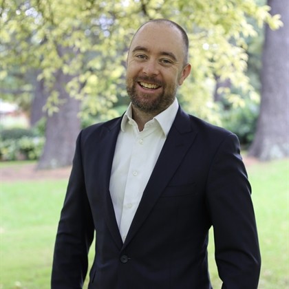 A man wearing a suit